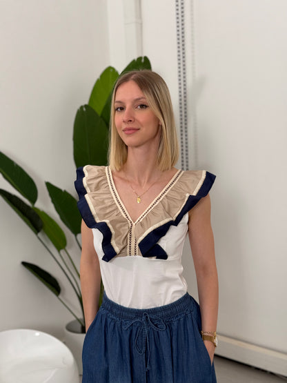 Top scollo V con frappa